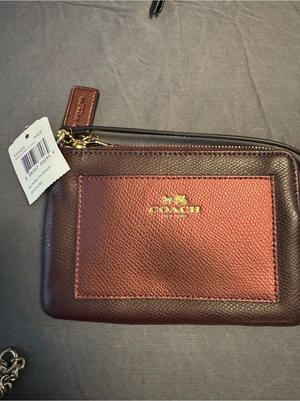 Coach Bi-Color Pebbled Leather Wristlet in Burgundy and Brown